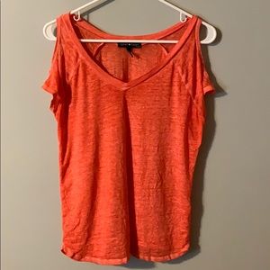 coral shirt with open shoulders